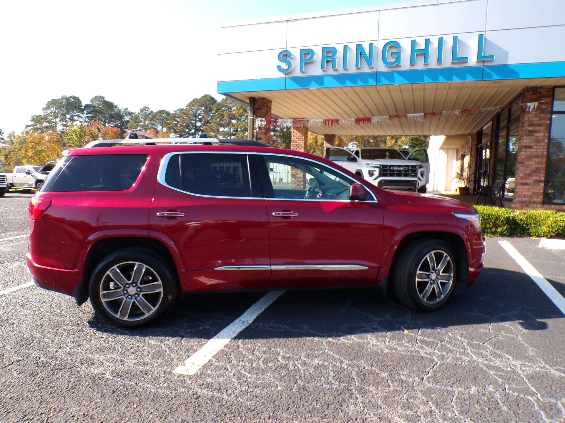 2019 GMC Acadia Denali in Red Quartz Tintcoat — front three-quarter view