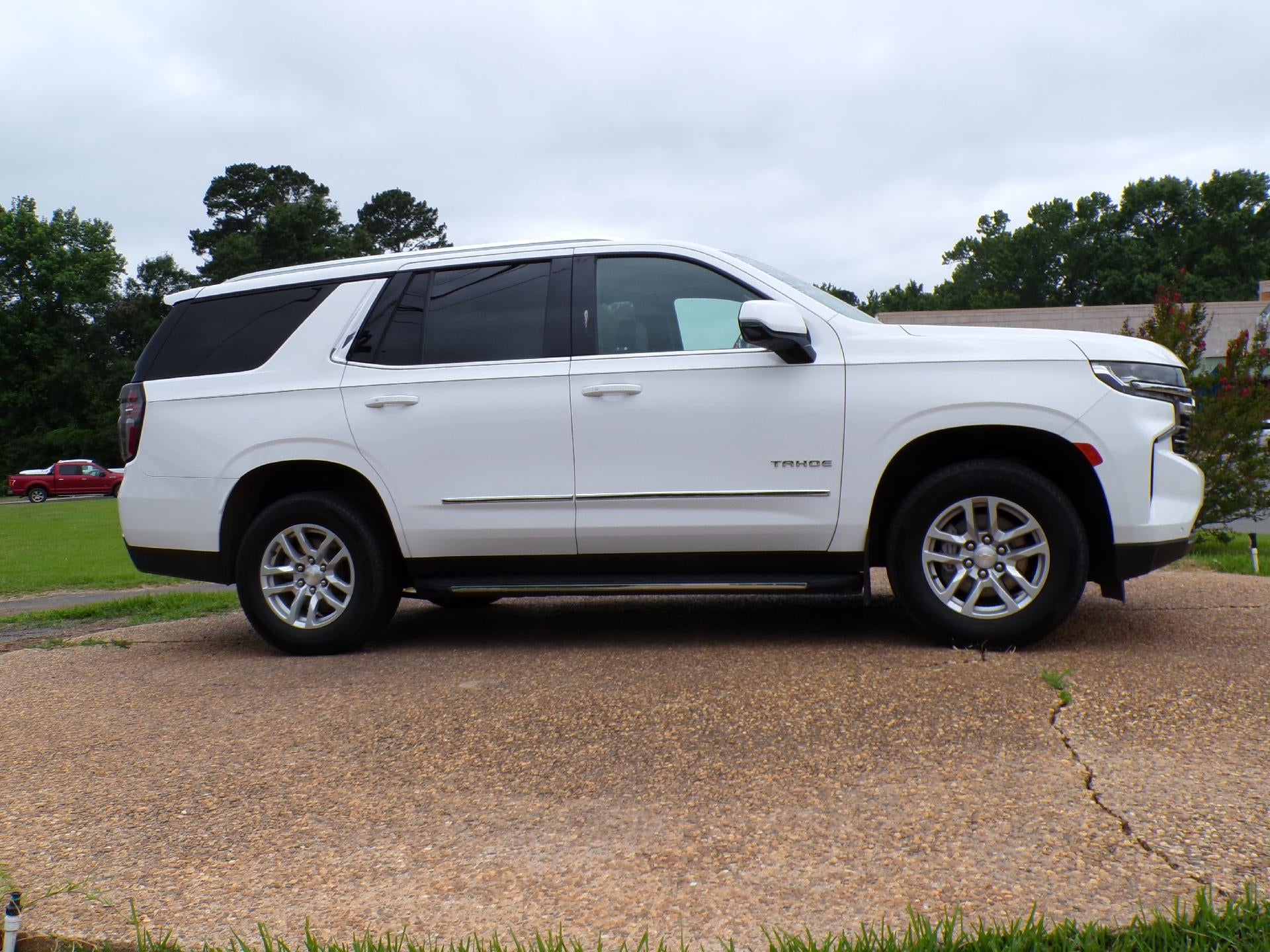 2023 Chevrolet Tahoe LT in Summit White — front three-quarter view
