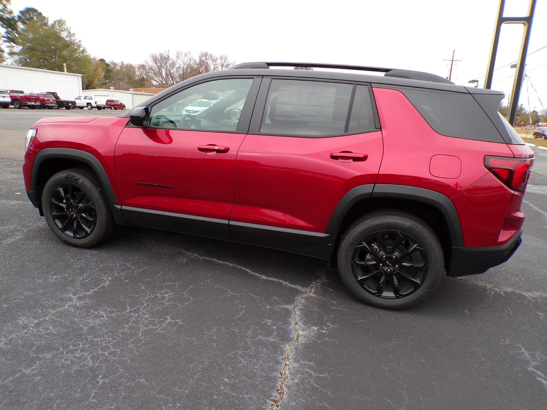 2026 GMC Terrain Elevation in Volcanic Red Tintcoat — front three-quarter view