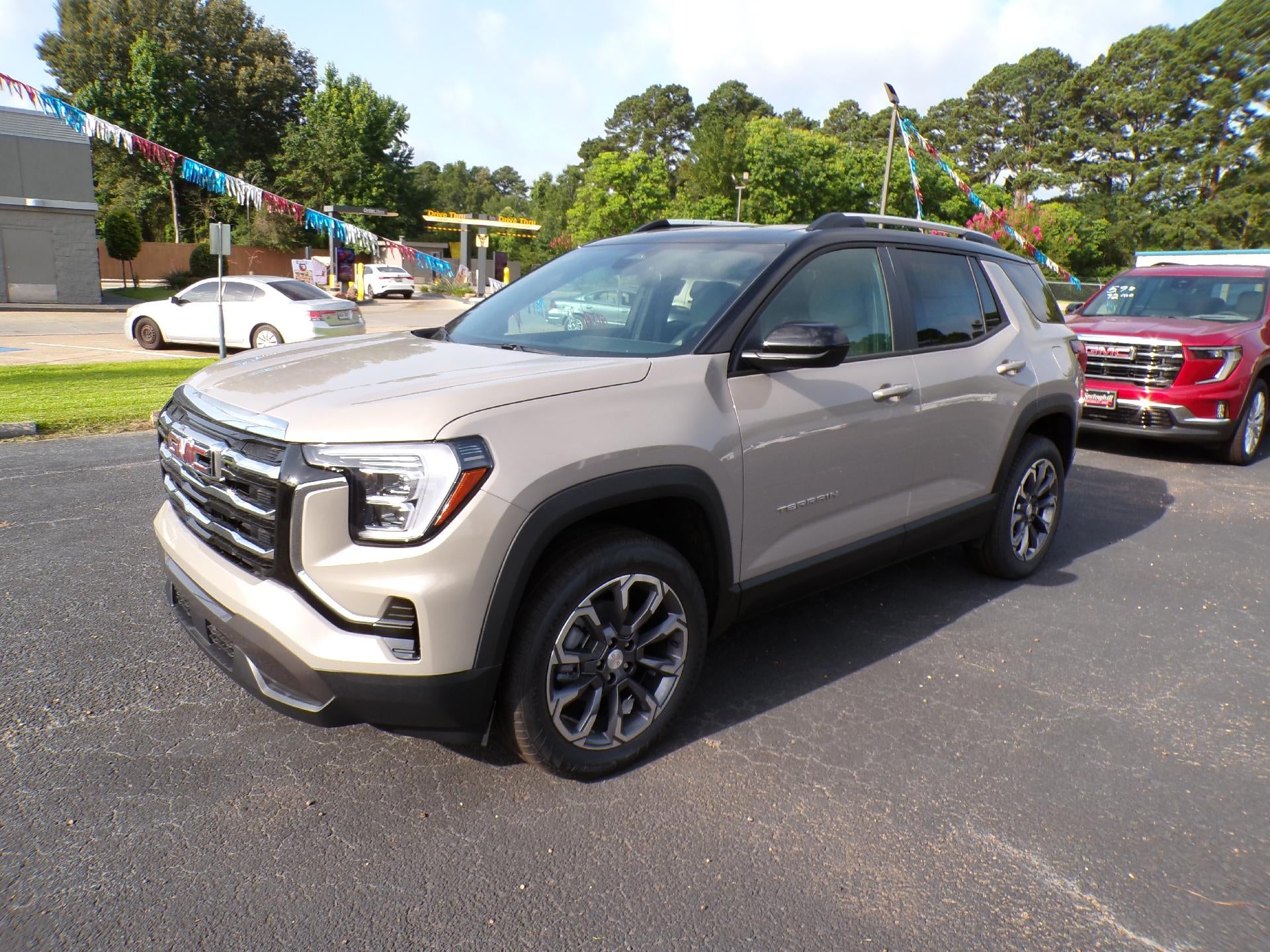 2026 GMC Terrain Elevation in Riverstone Metallic — front three-quarter view