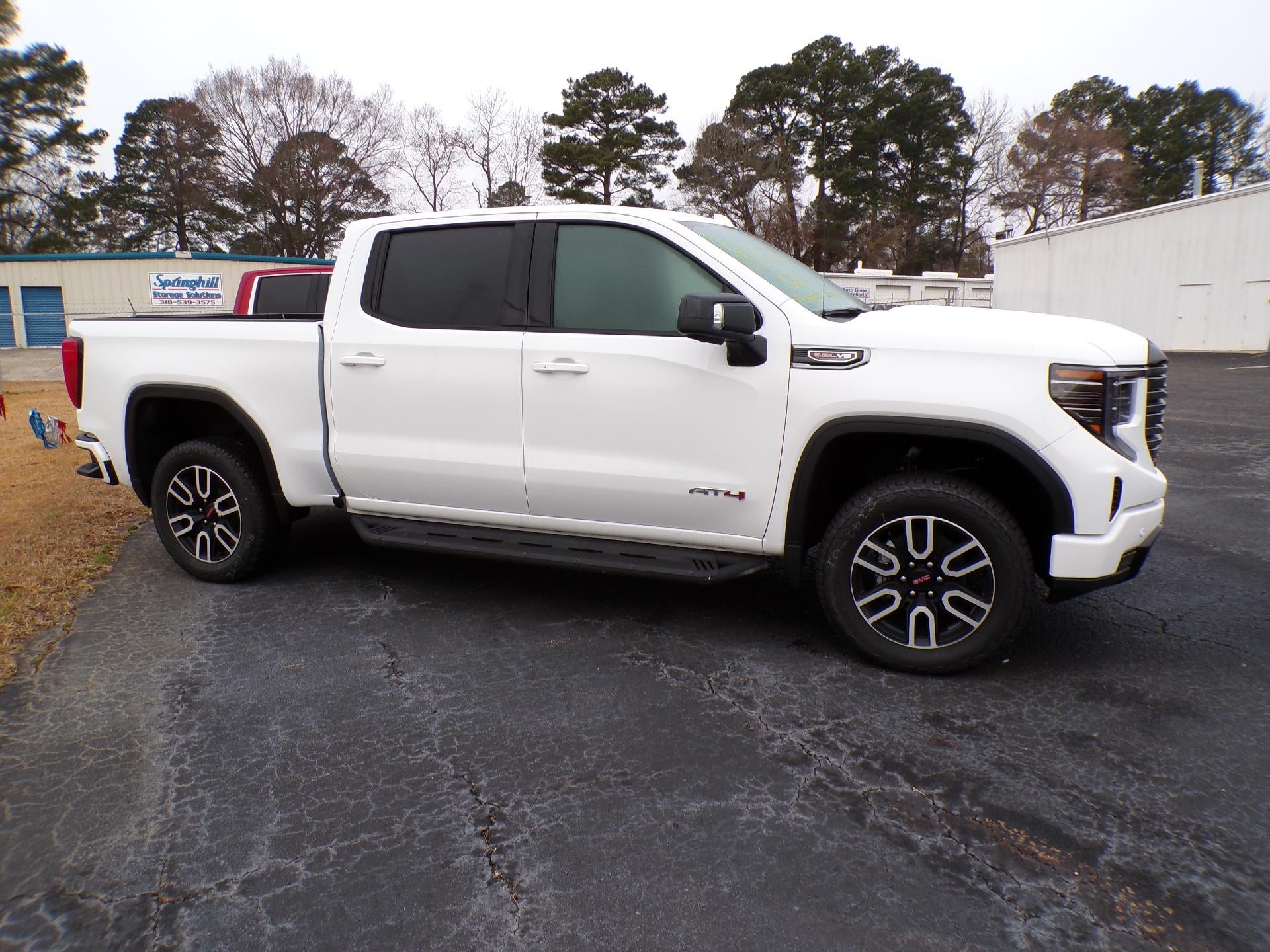 2026 GMC Sierra 1500 AT4 in Summit White — front three-quarter view